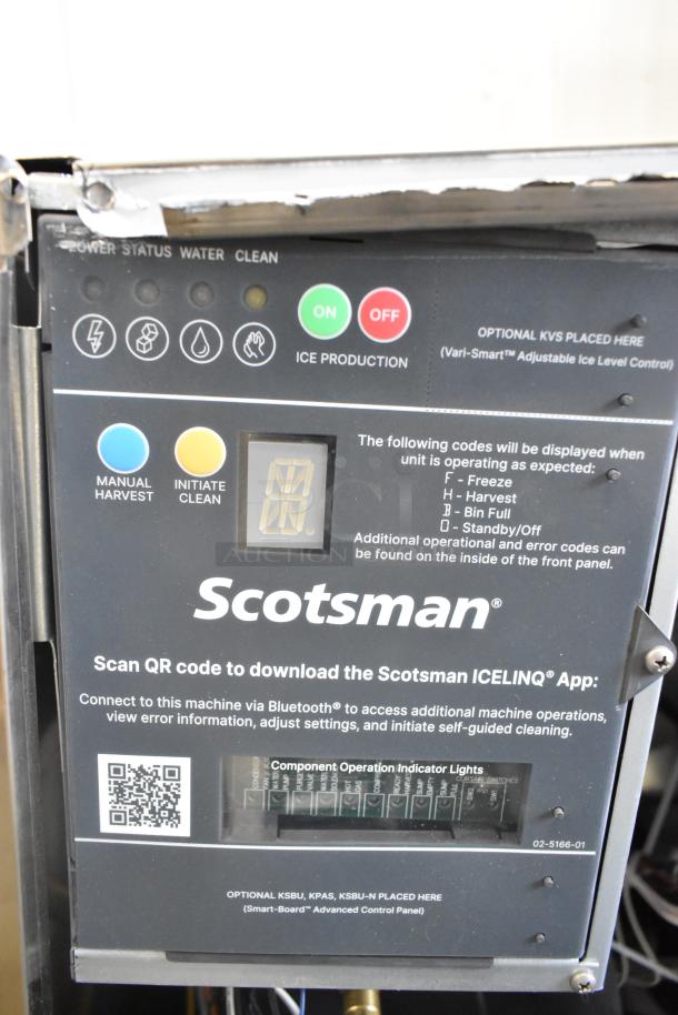 2024 Scotsman MC1030MA-32A stainless steel ice machine control panel. Features Bluetooth connectivity, indicator lights, and QR code for app download.