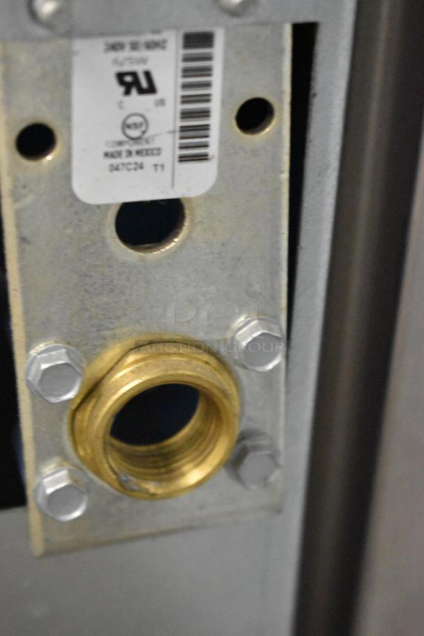 2024 Scotsman MC1030MA-32A Ice Machine, stainless steel, commercial use, 208/230V 1 phase. Label shows parts and UK logo.