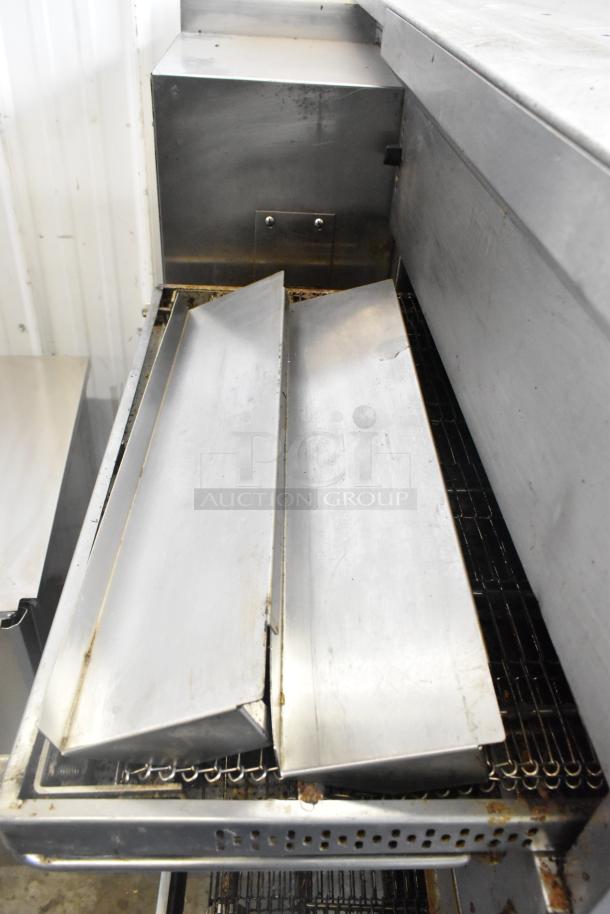 2021 Middleby Marshall PS638G stainless steel conveyor pizza oven, natural gas, on commercial casters.
