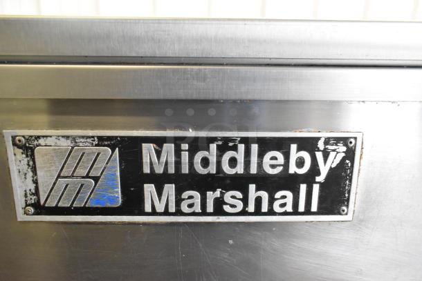 Middleby Marshall PS638G stainless steel commercial conveyor pizza ovens with brand label visible. 89,000 BTU, natural gas.