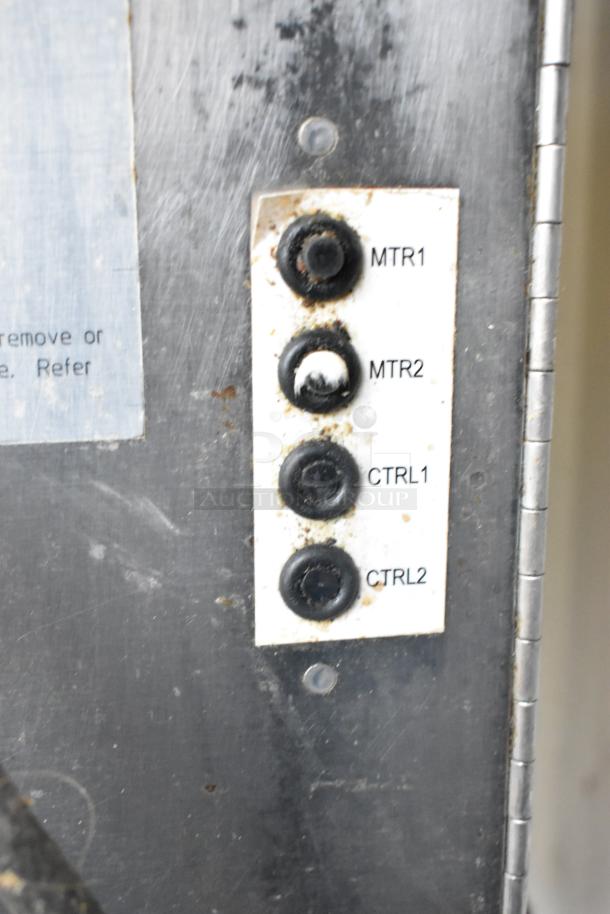 Control panel of Middleby Marshall PS638G pizza oven showing buttons labeled MTR1, MTR2, CTRL1, and CTRL2.