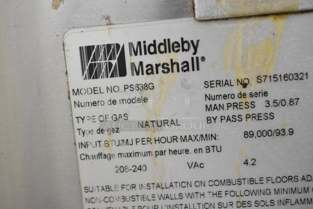 Middleby Marshall PS638G pizza oven label, displaying model, serial number, and gas specifications, stained surface.