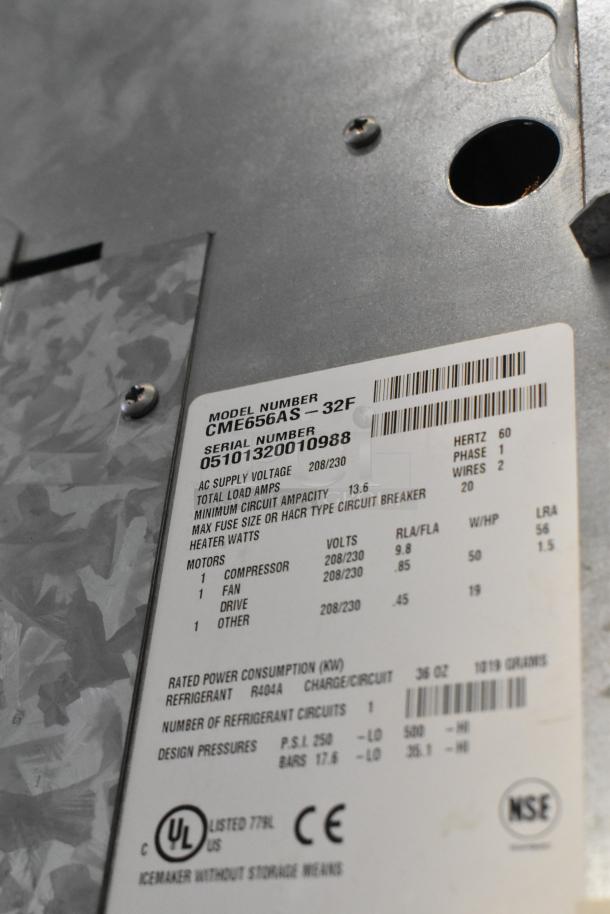 Scotsman CME656AS-32F commercial ice machine label, detailing model, serial number, 208/230 volts, 1 phase.