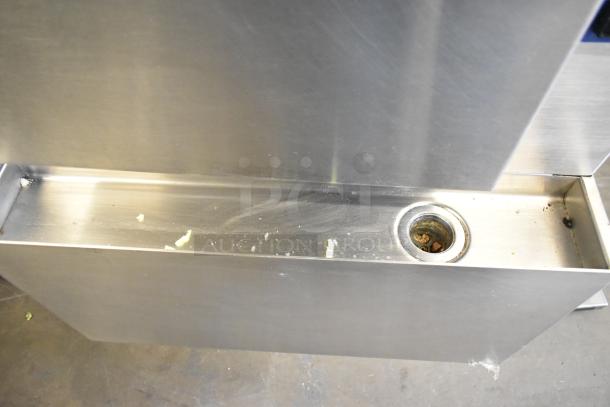 Cleveland SteamCraft Ultra 10 stainless steel steam cabinet, commercial use. Shows interior chamber condition with some residue.