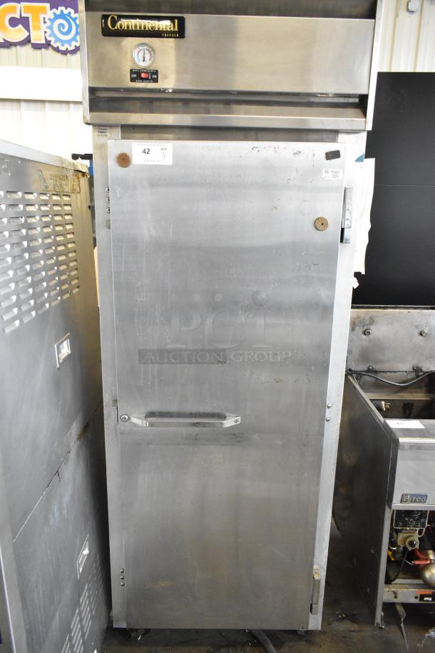 Continental 1FE stainless steel commercial single-door reach-in freezer, showing front view. Visible thermometer and brand label.