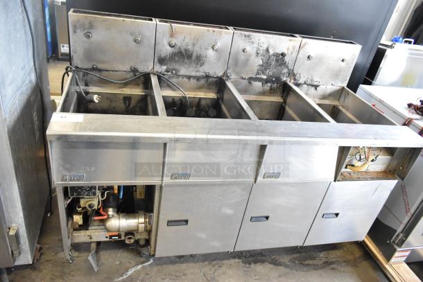 Pitco Frialator stainless steel 4-bay gas fryer on casters, commercial use, visible wiring, moderate wear, brand label present.