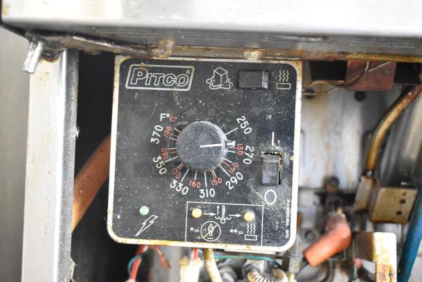 Pitco Frialator 4-bay deep fat fryer control panel, showing temperature settings and switches. Used condition with visible rust.