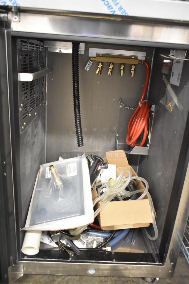 Perlick DDS36 stainless steel beer dispenser, interior view. Scratch and dent model, accommodates (2) 1/4 kegs.