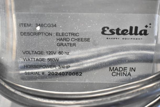 Estella 348CG34 electric hard cheese grater label shows 120V, 560W, 3/4 HP details. Made in China, serial #2024070062.