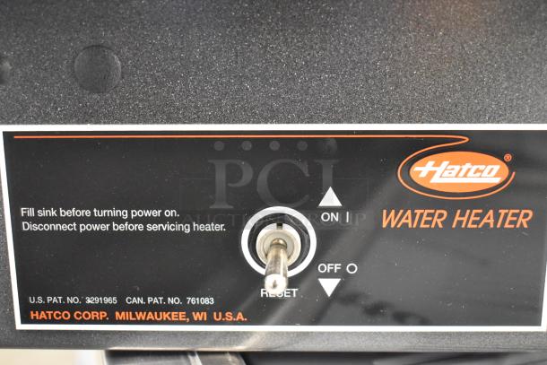 Hatco commercial water heater control panel, new condition, label indicates model information and power switch settings.