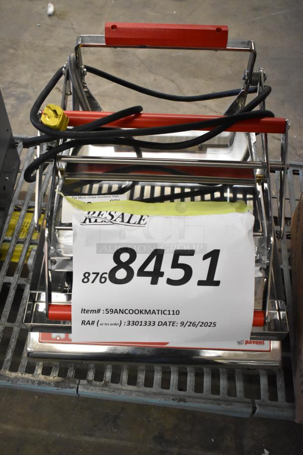 BRAND NEW 2024 Pavoni Newcookmatic V1 pastry press, stainless steel, scratch and dent, 110V, 1 phase, auction tag visible.