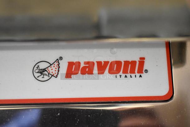 Stainless steel Pavoni Newcookmatic V1 pastry press. Brand new with scratches and dents. Visible logo: Pavoni. 110V, 1 Phase.