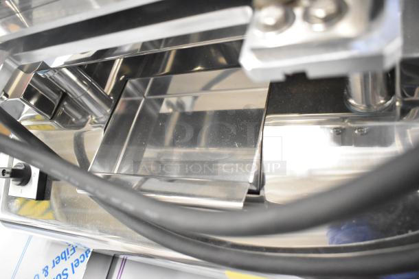 BRAND NEW Pavoni Newcookmatic V1 stainless steel pastry heated press. Minor scratches. 110V, 1 Phase. Model Newcookmatic V1.