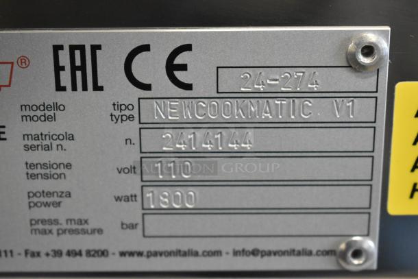 Label on 2024 Pavoni Newcookmatic V1 showing model, serial number 2414144, 110 volts, 1800 watts.
