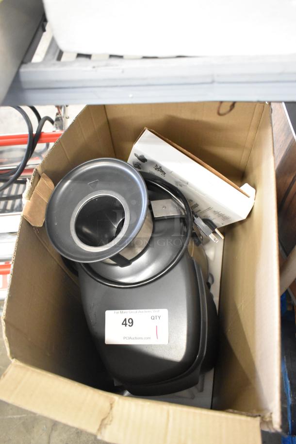 Brand new Robot Coupe J100 commercial juicer, stainless steel, scratch and dent, continuous pulp ejection, 120V, 1-phase.