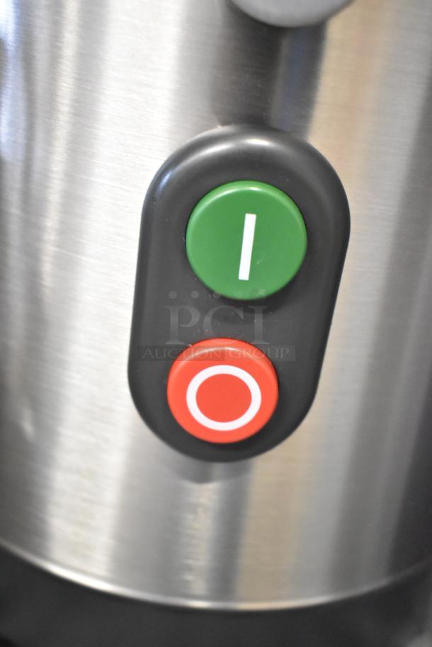 Brand new Robot Coupe J100 stainless steel commercial juicer control buttons. Green for start, red for stop. 120 volts, 1 phase.