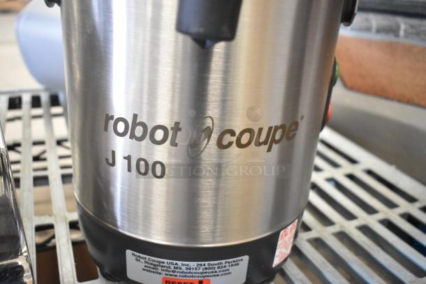 Brand new Robot Coupe J100 stainless steel juicer, 120V, 1 phase, with continuous pulp ejection. Slight scratch and dent.