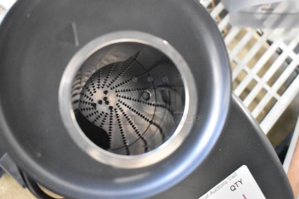 Brand new Robot Coupe J100 stainless steel commercial juicer, continuous pulp ejection, 120V, with visible scratch.