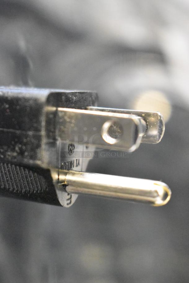 Close-up of a power plug for a 2024 RiceMaster Town 56916S 72 Cup Commercial Rice Warmer, 120 Volts, 1 Phase.