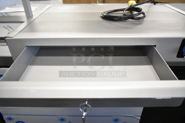 BRAND NEW SCRATCH AND DENT! 2024 Pavoni Lampada stainless steel sugar heating lamp, 230 volts, showing open drawer and coiled cord.