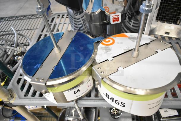 Brand new stainless steel popcorn kettle for merchandiser, with scratch and dent condition. Includes labels showing inventory numbers 56 and 8465.