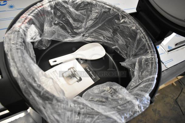 Brand new Avantco 177RCSB90 digital electric rice cooker, 90 cup capacity, includes user manual and serving spoon. 240V, 1 Phase.