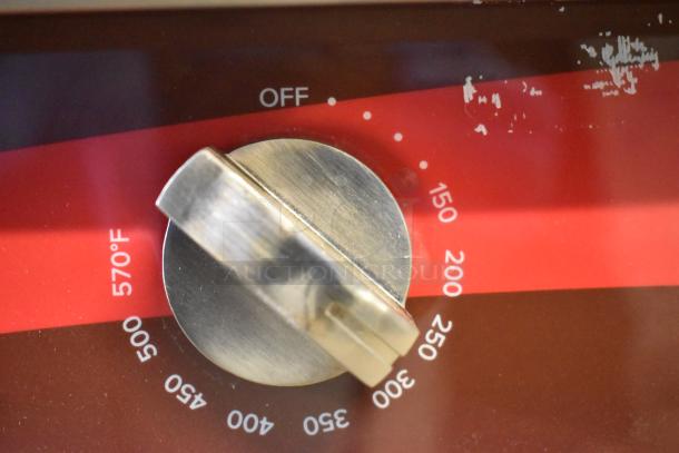Thermostatic control knob of Avantco 177EG24N electric griddle, showing temperature settings from OFF to 570°F.