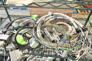 Various industrial wires and connectors, mixed lot of 14 items. Features braided and multi-color cables. Visible labels indicate quantity and specifications.