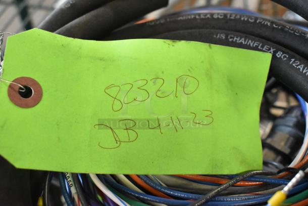 Bundle of 14 various wires labeled "823210" on a green tag, dated 4-11-23, in good condition.