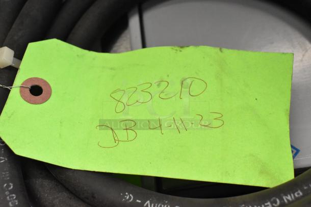 Bundle of 14 various items including wires with visible green tag. Tag has handwritten numbers "82320" and date "4-11-23."