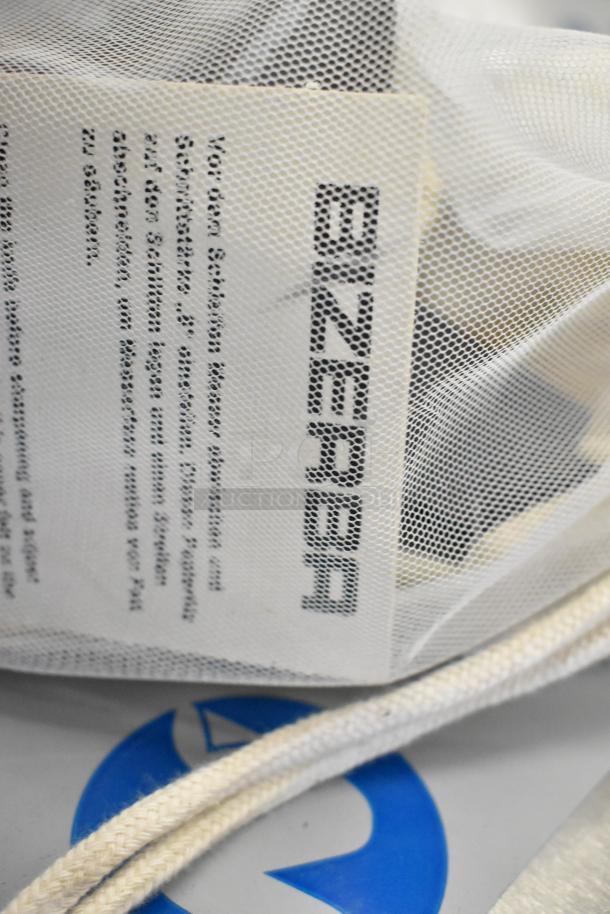 "New Bizerba Meat Slicer Blade Sharpener in packaging with label visible, scratch and dent condition."