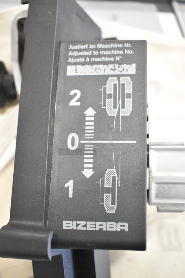 Brand new Bizerba meat slicer blade sharpener, black, with settings indicator; minor cosmetic scratches.