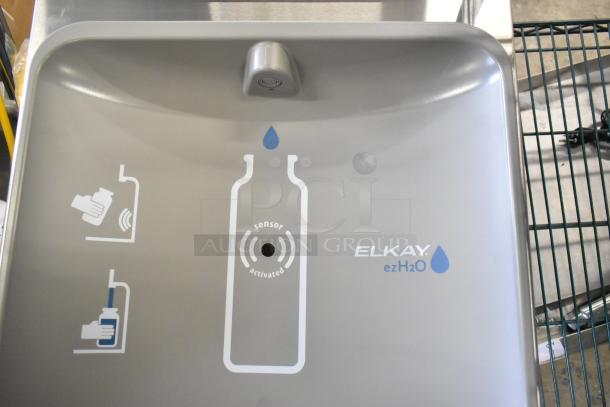 Brand new Elkay ezH2O water bottle filler with drip tray. Sensor activated. Scratch and dent condition.
