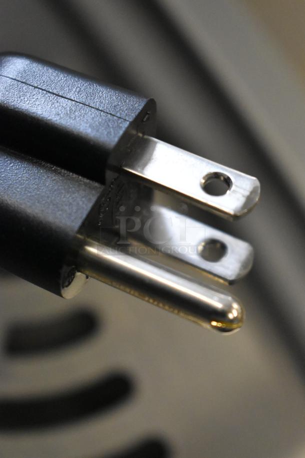 Plug connector of the Elkay Water Bottle Filler and Drip Tray, brand new, with small scratches.