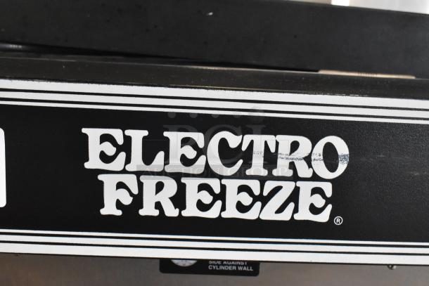Electro Freeze CS8-237 stainless steel countertop ice cream machine, 2-flavor with twist. Model label shown.