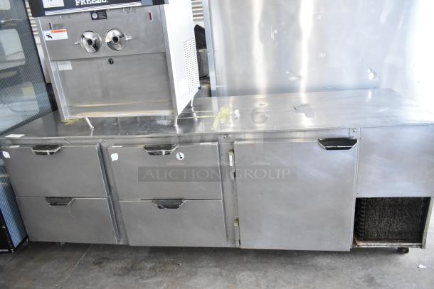 Beverage Air UCRD93A-4-23 stainless steel commercial undercounter cooler with 4 drawers and 1 door, on casters. 115V.