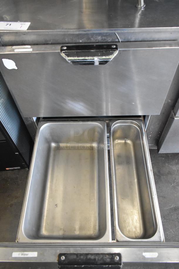 Beverage Air UCRD93A-4-23 stainless steel cooler, 4 drawers, 1 door, commercial casters, 115 volts, good condition.