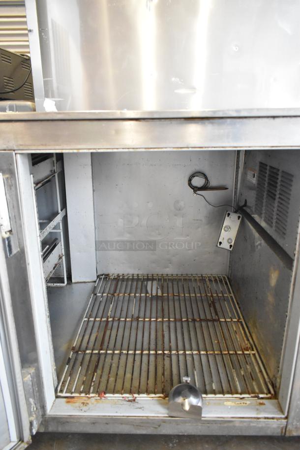 Beverage Air UCRD93A-4-23 stainless steel undercounter cooler with 4 drawers, 1 door, on commercial casters. 115V, 1 phase.