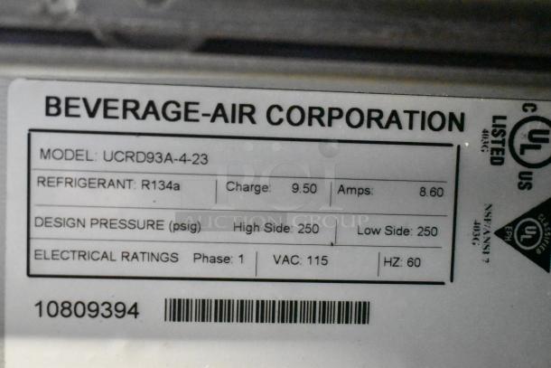 Sticker label of Beverage Air UCRD93A-4-23 Undercounter Cooler detailing model, refrigerant, design pressure, and electrical ratings.