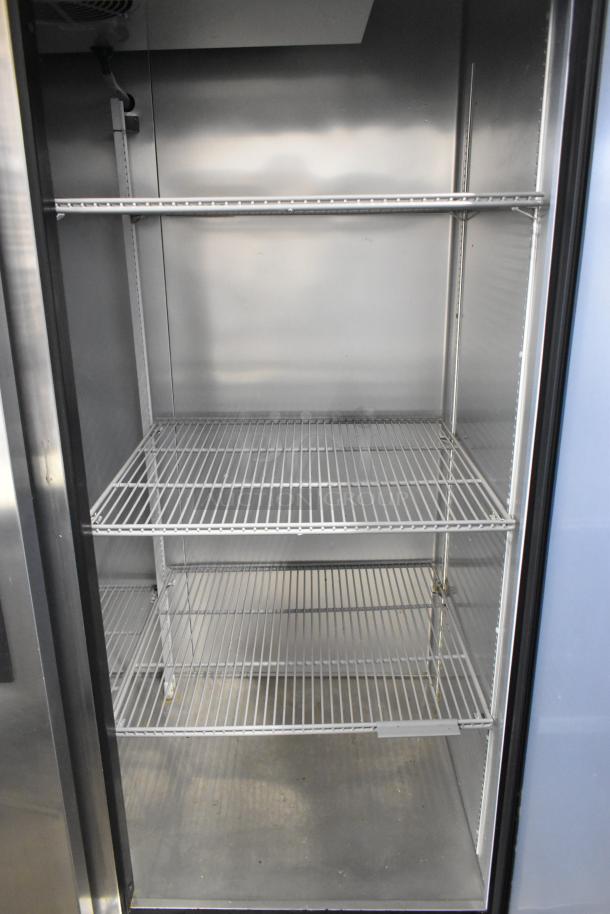 2019 True T-49-HC 2 Door Cooler, stainless steel, poly-coated racks, 115V, 1 phase, excellent condition.