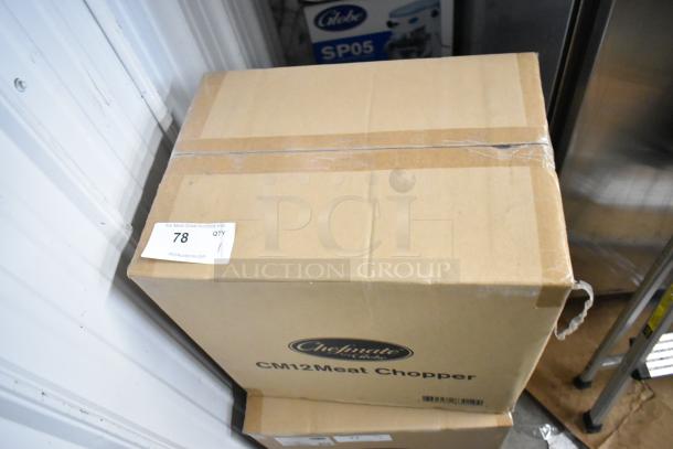 Boxed Globe CM12 Stainless Steel Commercial Meat Chopper. New, 250 lbs/hr, #12 head, 115V, 1 phase. Auction label tagged.