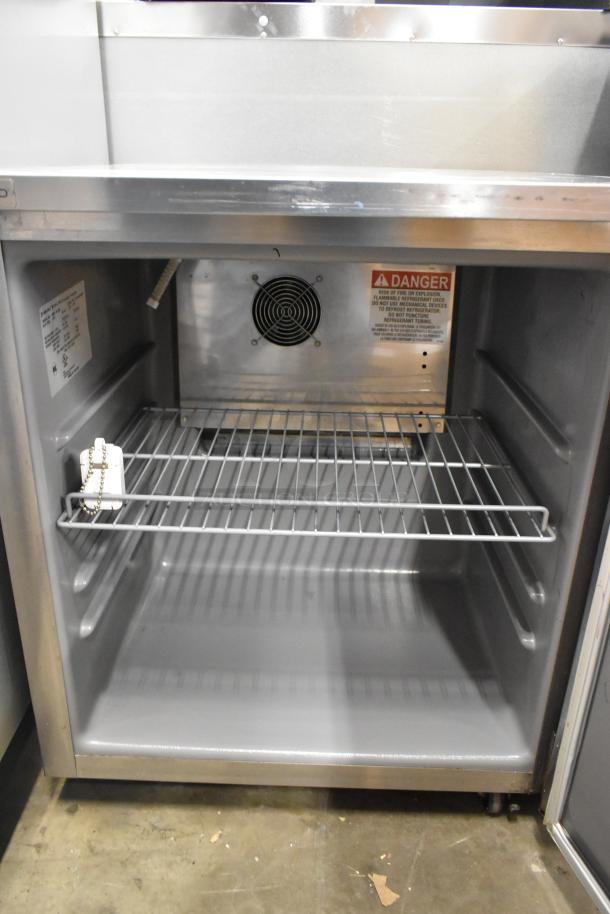 2021 Delfield 406P-STAR4 stainless steel undercounter cooler, single door, 115V, 1 Phase, excellent condition, safety labels visible.