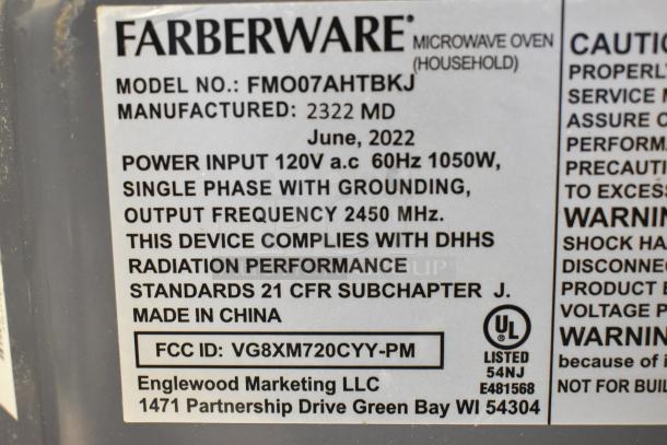 Label of a 2022 Farberware FMO07AHTBKJ Metal Countertop Microwave Oven, 120V, 1050W, 2450MHz, made in China.