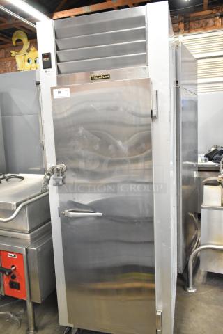 Traulsen G12010 stainless steel commercial single door reach-in freezer with racks, 115 volts, 1 phase, in used condition.