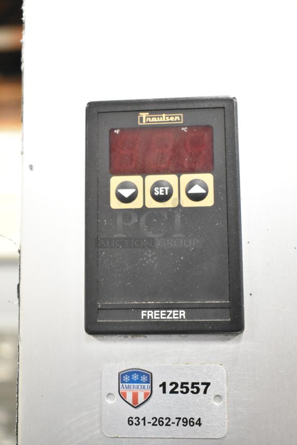 Traulsen G12010 stainless steel single door reach-in freezer control panel with buttons. Includes Americold label, 115 volts.