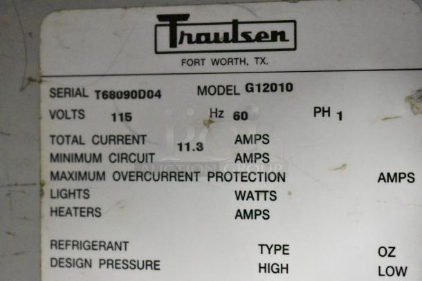 Traulsen G12010 stainless steel single door reach-in freezer label, showing serial T68090D04, 115V, 11.3 amps, 1 phase.