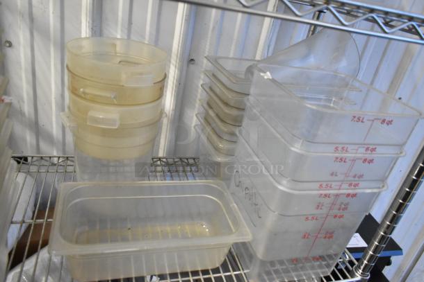 Lot of poly drop-in bins and containers, various sizes, with measurement markings, visible wear, shelving not included.