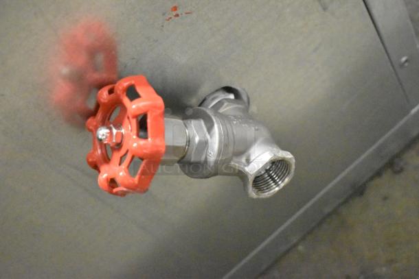 Red valve handle detail on ServIt 423SDW1H stainless steel food well, showing part of the drop-in hot food system.