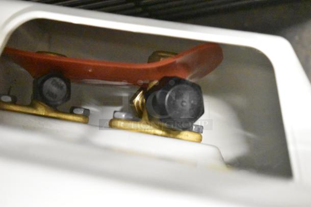 Pioneer YN018GLSI25RPH metal air conditioner compressor, 208-230V, 1 phase; close-up of fittings and connections.