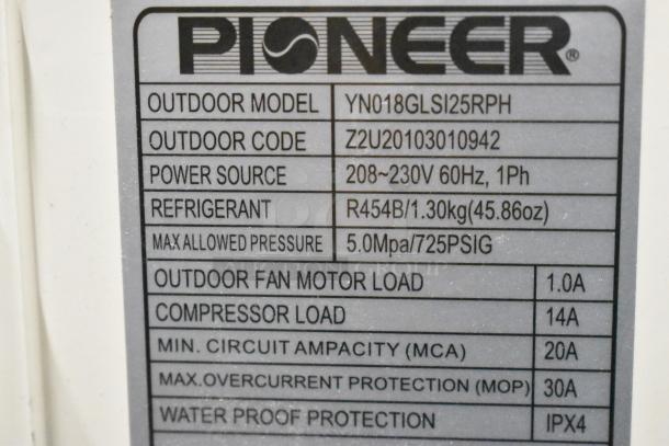 Pioneer YN018GLSI25RPH air conditioner compressor label showing model, power source, refrigerant, and pressure specifications.
